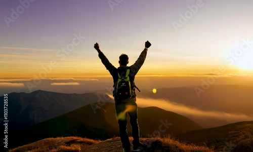 Wallpaper Mural Hiker Man Standing on Top of Mountain Peak Summit at Sunset Golden Hour Conquering Fears Anxiety Stress Victory Success Concept Torontodigital.ca