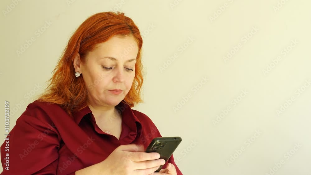 Middle age woman talks using smartphone, business processing Middle age woman talks using smartphone, business processing