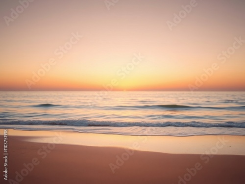 Soft focus on a vast ocean with a sandy beach in the foreground at sunset, soft focus, soothing ambiance