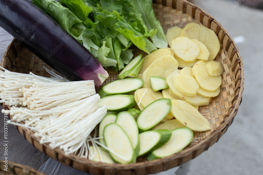 Fresh grilled vegetable ingredients in a bamboo sieve Fresh grilled vegetable ingredients in a bamboo sieve