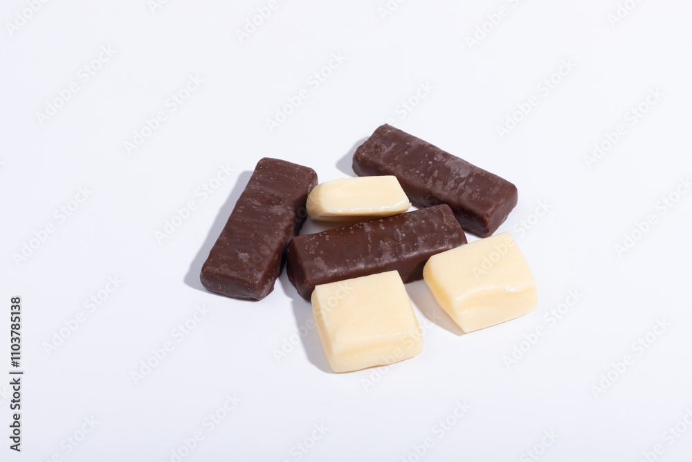 Chocolate and creme candies on a white background Chocolate and creme candies on a white background