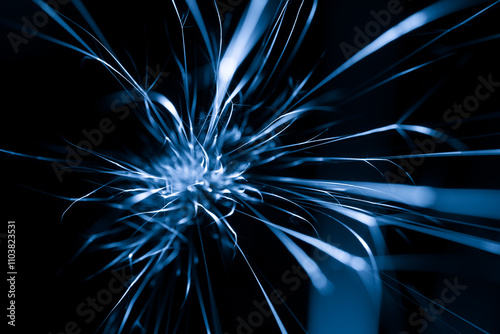 blue sparks from the grinder glowing in the dark