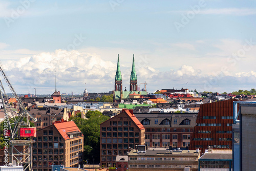 Helsinki city skyline from sea port on sunny summer day on July 6, 2024 in Helsinki, Finland. photo