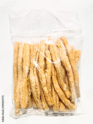 A clear plastic bag filled with crispy and crunchy traditional Malaysian snacks, coated with sugar for a sweet and satisfying treat. Perfect for snacking anytime and sharing with friends or family.