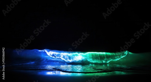 Dramatic bioluminescent wave glowing in the dark night photo