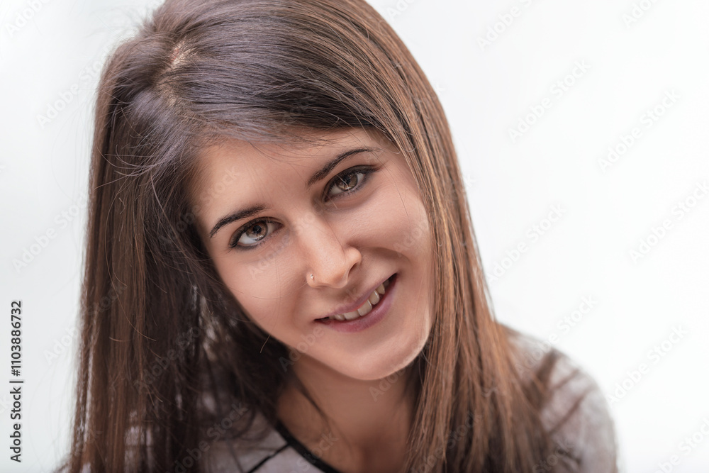 Young woman smiling and expressing positive emotions Young woman smiling and expressing positive emotions
