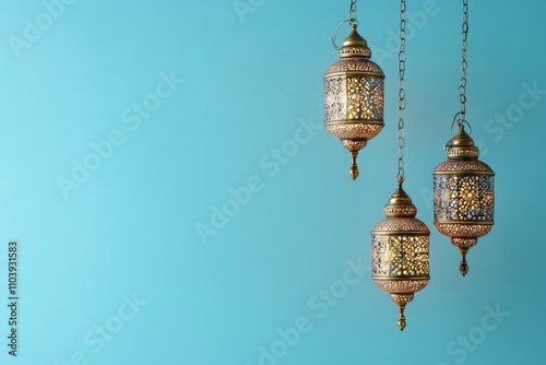 Arabian traditional lantern Light Lamp and Tasbeeh on light blue color background.  photo