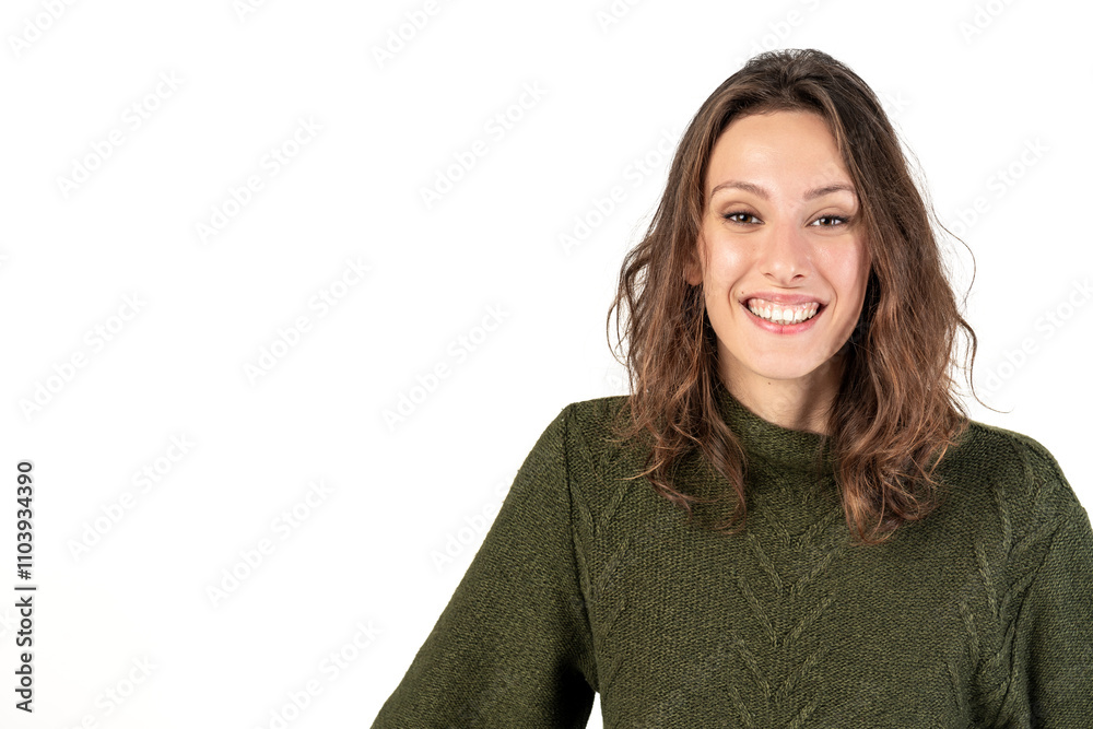 Close-up portrait of beautiful young and smiling woman. Model looking at camera and wearing green sweater. White background with copy space Close-up portrait of beautiful young and smiling woman. Model looking at camera and wearing green sweater. White background with copy space
