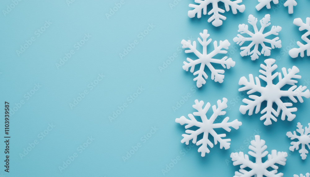 A serene image of white snowflakes on a light blue background, evoking a wintery atmosphere and a sense of tranquility. A serene image of white snowflakes on a light blue background, evoking a wintery atmosphere and a sense of tranquility.