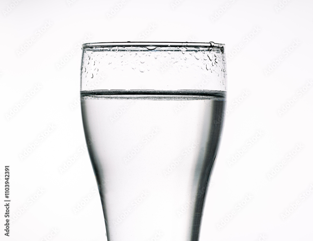 Close-up of drinking glass isolated on white background,Glass with water on a white background