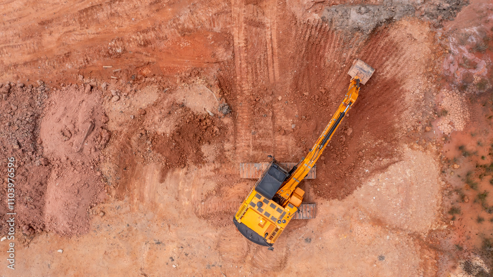 Aerial view road motor grader flatting dirt road surface, Motor grader road construction grader industrial machine construction site new road, Aerial view group excavator working on construction site. Aerial view road motor grader flatting dirt road surface, Motor grader road construction grader industrial machine construction site new road, Aerial view group excavator working on construction site.