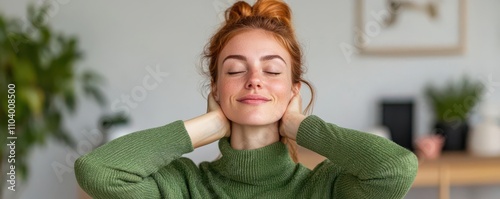 office syndrome concept. A worker performing side neck stretches to ease tension and improve flexibility in a desk-based workplace