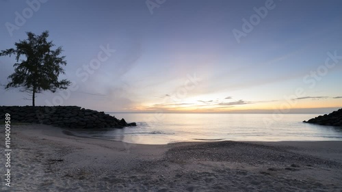 Sunrise is reflection on beach at ocean in Tropicana country