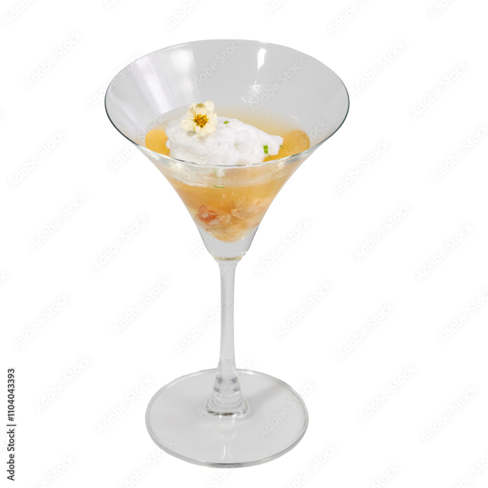 A stylish cocktail served in a martini glass, featuring a creamy topping and vibrant orange-colored contents. A stylish cocktail served in a martini glass, featuring a creamy topping and vibrant orange-colored contents.