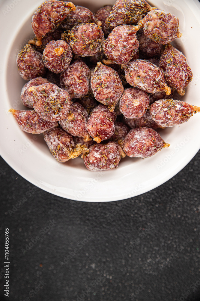 small smoked sausages appetizer mini salami sausage kabanosy fast food fresh tasty food dish delicious gourmet food background on the table rustic food top view copy space small smoked sausages appetizer mini salami sausage kabanosy fast food fresh tasty food dish delicious gourmet food background on the table rustic food top view copy space