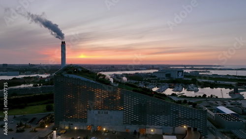 Aerial view of famous places heat and power waste to energy plant and sport park in Copenhagen at sunset, Denmark.