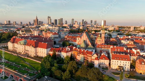 Aerial view of the Warszawa cityscape. Old town and modern skyscrapers at sunrise, Royal Castle. Poland.