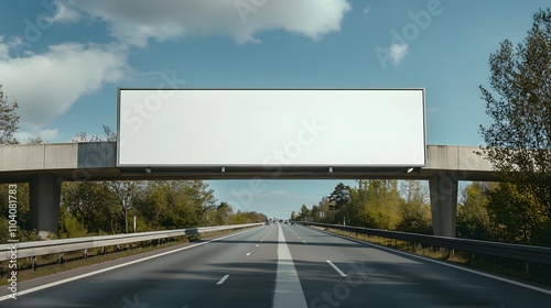 Empty billboard on a bridge, spanning over a silent highway with no vehicles.