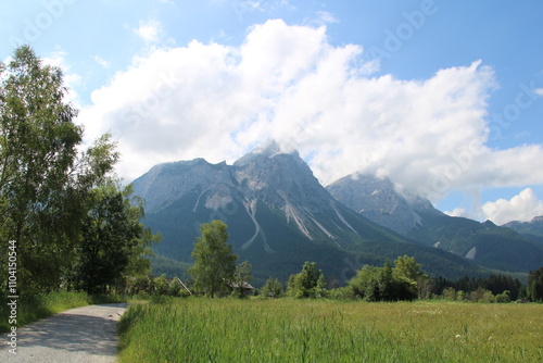 Alpine valley with lush meadows in the Wetterstein Mountains close to the town of Ehrwald - Cycling the transalpine route Via Claudia Augusta photo