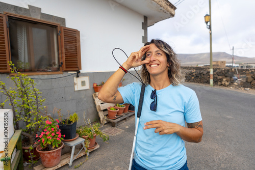 Woman embracing daily life with deaf-blindness challenges photo