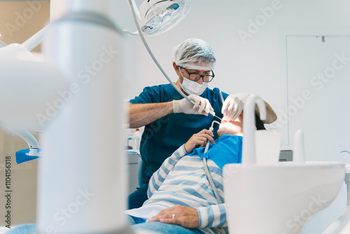 Dentist Performing Routine Check-Up in a Modern Clinic