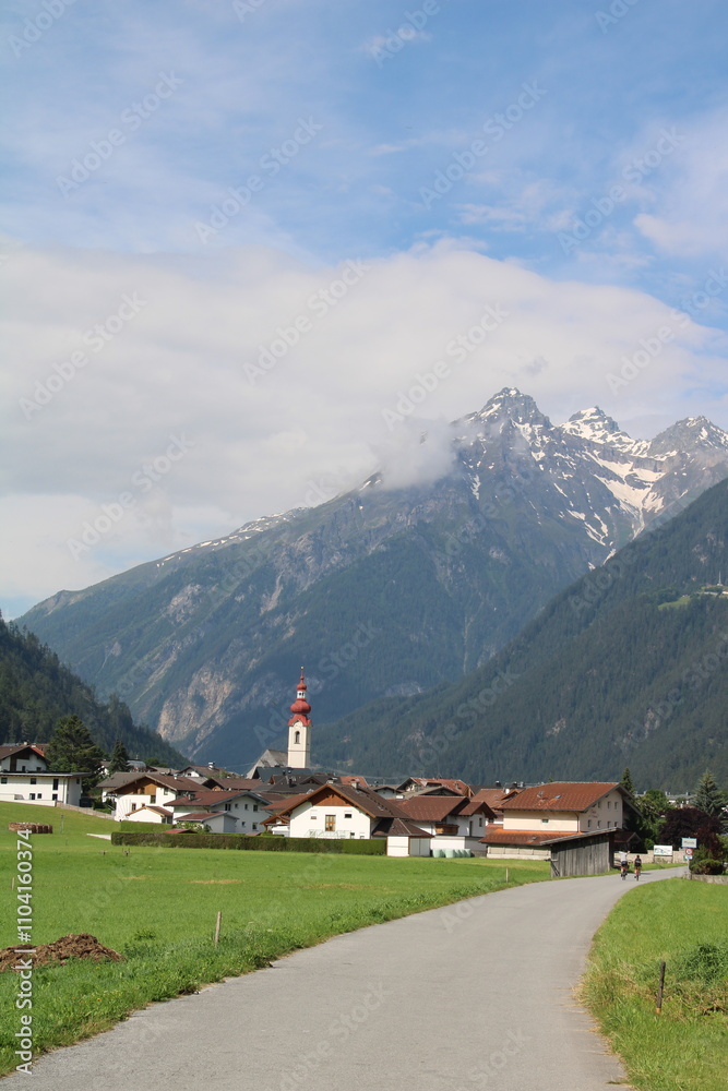Cycling route next to the town of Pfunds, Tyrol Inntal - Cycling the transalpine route Via Claudia Augusta Cycling route next to the town of Pfunds, Tyrol Inntal - Cycling the transalpine route Via Claudia Augusta