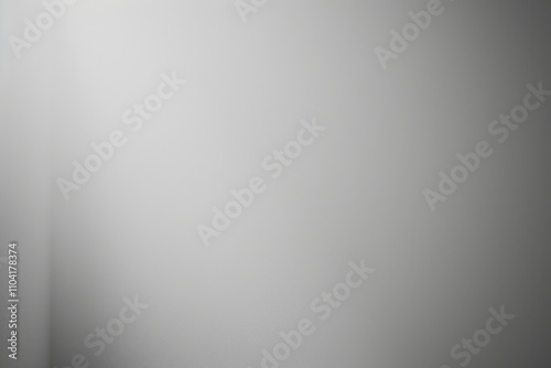 A minimalist gray background with soft lighting, creating a serene atmosphere.