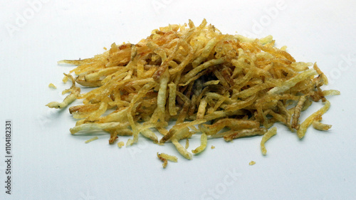 Mustofa potatoes are a traditional Indonesian food. Potatoes are thinly sliced, fried with spicy seasoning. photo