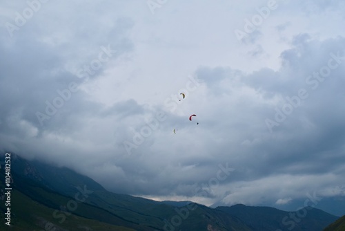 paraglider over the mountains