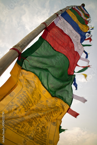 Prayer flags in Bhutan blowing in the wind photo