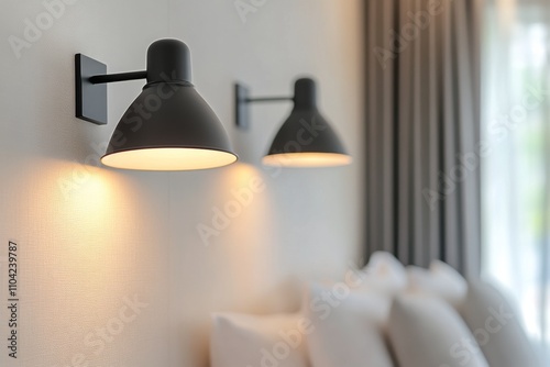 Elegant wall light fixture illuminating a modern interior space with a green plant