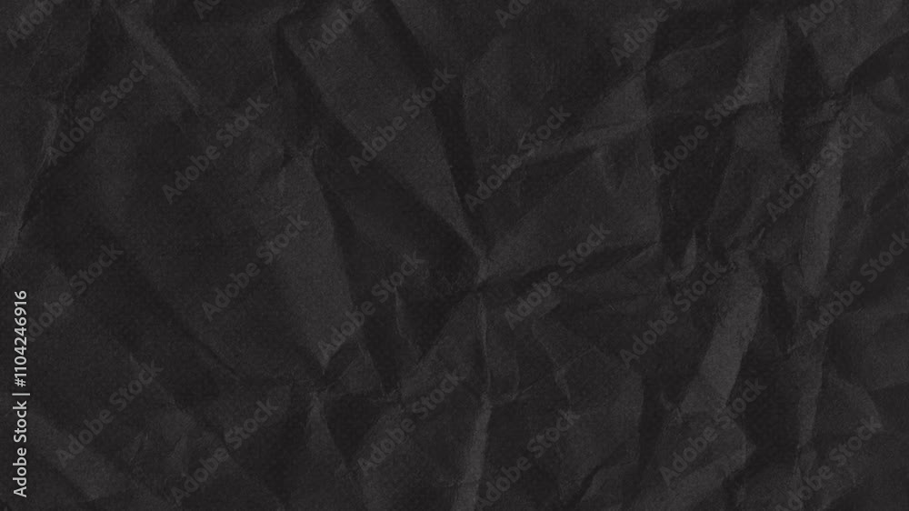crumpled black paper texture abstract design