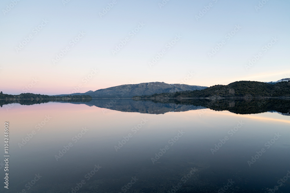 Panorama view of Lake Aluminé and the Andes mountains in the background, at sunset, in Villa Pehuenia, Patagonia Argentina. Panorama view of Lake Aluminé and the Andes mountains in the background, at sunset, in Villa Pehuenia, Patagonia Argentina.