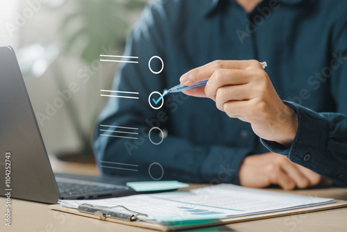 check, document, checklist, choice, guarantee, answer, assurance, certificate, choose, list. A person is using a pen to check off items. as the person is actively working through a list or checklist.