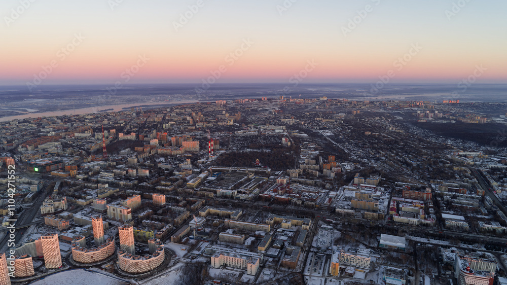 Fototapeta premium Cityscape with a beautiful sunset in the background