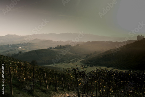 the hills of the Piedmontese Langhe with autumn colours surrounded by centuries-old vineyards