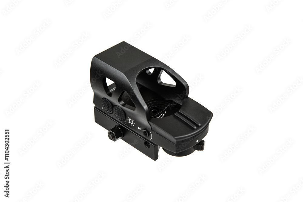 A black tactical reflex sight with adjustment knobs and a mounting base, designed for precision aiming on firearms, isolated on a white back. A black tactical reflex sight with adjustment knobs and a mounting base, designed for precision aiming on firearms, isolated on a white back.