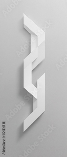 Overhead view of a white abstract design element on a gray background, highlighting its two-dimensional quality , , overhead view, artistic expression, visual interest, gray background photo