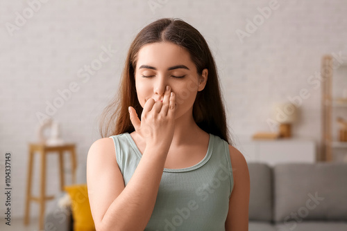 Pretty young woman doing br...