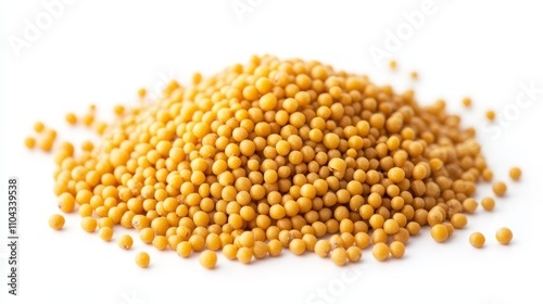  a pile of yellow mustard seeds on a white background The mustard seeds are a bright yellow color, and the contrast between the two colors creates a vivid and eye-c