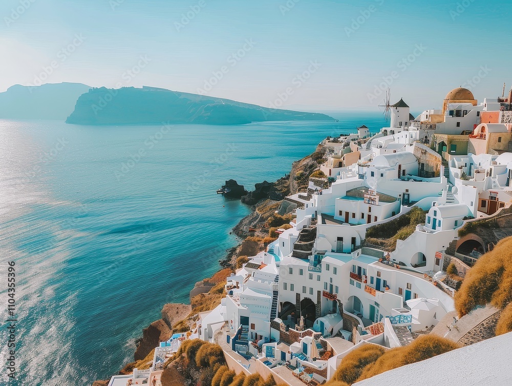 Naklejka premium Serene Seascape: Panoramic View of Whitewashed Church and Coastal Town