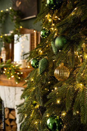Christmas tree decorated with lights and balls. Bokeh