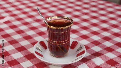 A Turkish Tea on Checkered Red Tablecloth