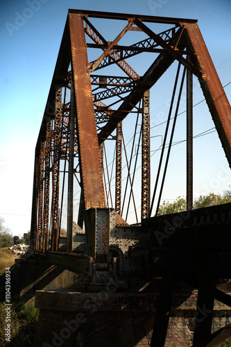 Railroad Trussle crossing the Guadalupe River South Texas, Rusty Bridge, Blue Skiy, Train  photo