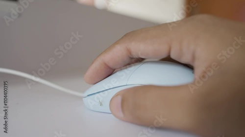 Computer mouse click by people hand