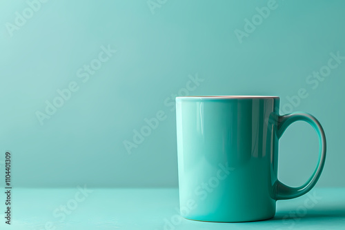 A vibrant teal coffee mug against a matching backdrop, exuding a fresh and modern aesthetic, perfect for any cozy setting.