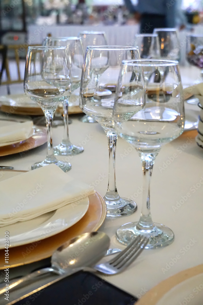 Table with glasses prepared for a formal dinner at a wedding Table with glasses prepared for a formal dinner at a wedding
