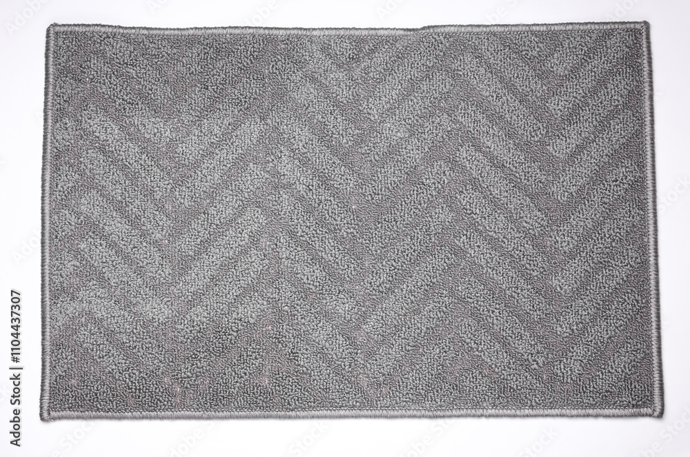 Fototapeta premium Gray bath rug on white background