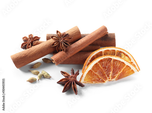 Different aromatic spices isolated on white. Christmas season