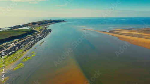 Aerial footage of the Hilbre Islands in Wirral Borough at the mouth of the River Dee, UK